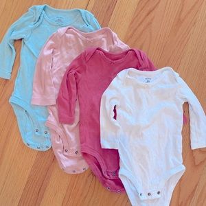 Carters long sleeve onesies, four included